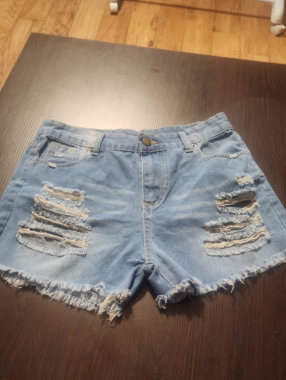Women's Distressed Light Blue Denim Shorts